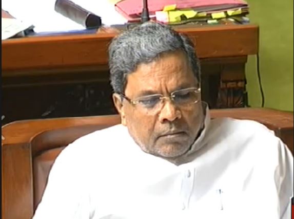 Karnataka Chief Minister Siddaramaiah again caught sleeping in Press Conference